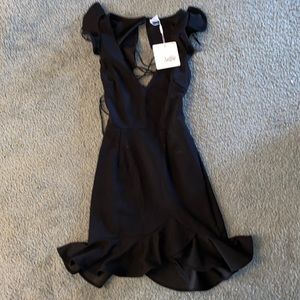 Brand new black open back dress